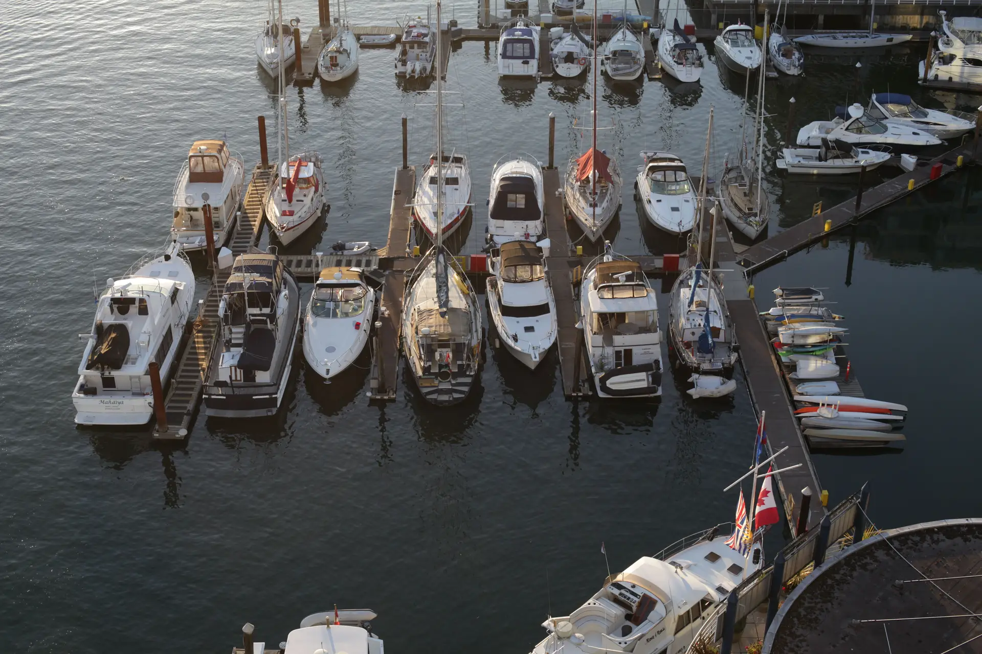 Vancouver coastal marina yachts and twilight city lights