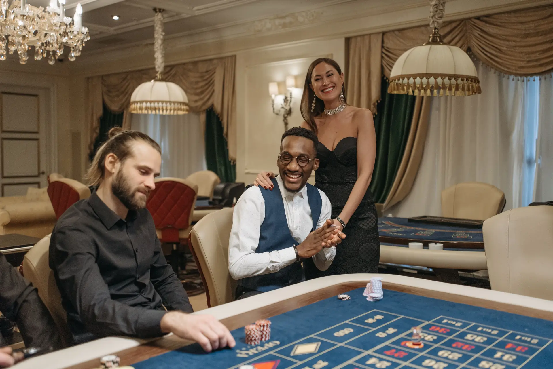 Guests participating in an elegant card tournament event